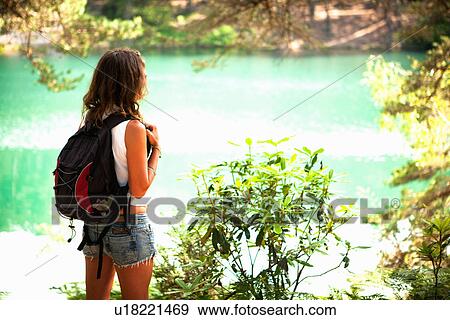 Woman by the Blue Pool, Wareham, Dorset, United Kingdom View Large Photo Image Stock Photo - Woman by the Blue Pool, Wareham, Dorset, United Kingdom. Fotosearch