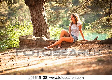 Woman by the Blue Pool, Wareham, Dorset, United Kingdom View Large Photo Image Stock Photo - Woman by the Blue Pool, Wareham, Dorset, United Kingdom. Fotosearch