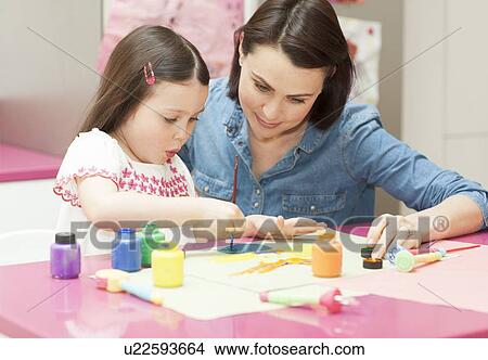Young girl painting View Large Photo Image Picture - Young girl painting. Fotosearch