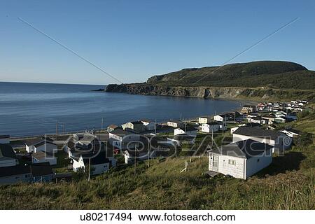Picture - Aerial view of Town along coastline of Trout River, Southeast Brook Falls, Gros Morne National Park, Newfoundland and Labrador, Canada. Fotosearch