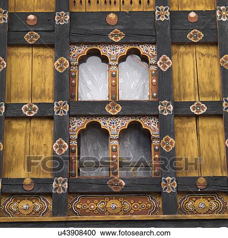 Stock Image - Architectural details of the windows of Rinpung Dzong, Paro Valley, Paro District, Bhutan. Fotosearch