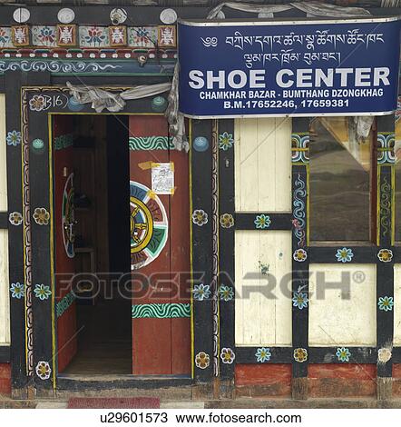 Stock Image - Banner at a shoe store, Chokhor Town, Bumthang District, Bhutan. Fotosearch