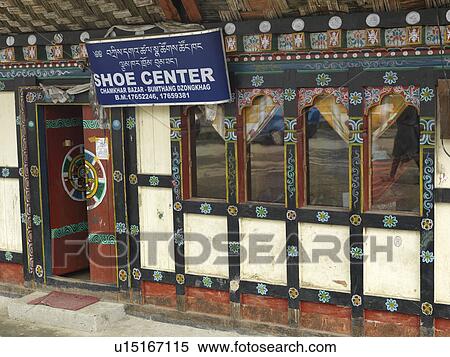 Stock Photography - Banner at a shoe store, Chokhor Town, Bumthang District, Bhutan. Fotosearch