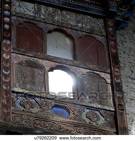 Stock Photo - Boarded windows at the Wangdichholing Palace Bumthang District, Bhutan. Fotosearch