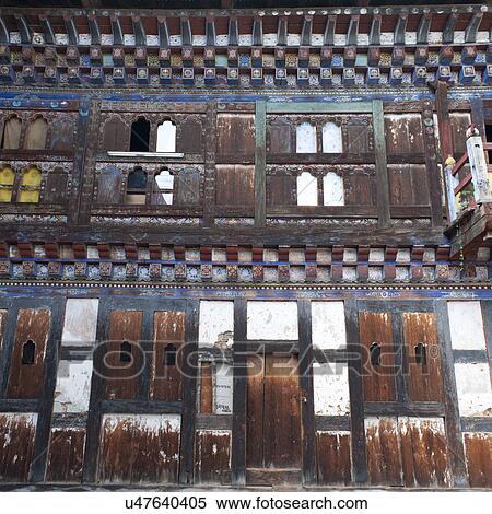 Stock Photography - Boarded windows at the Wangdichholing Palace Bumthang District, Bhutan. Fotosearch