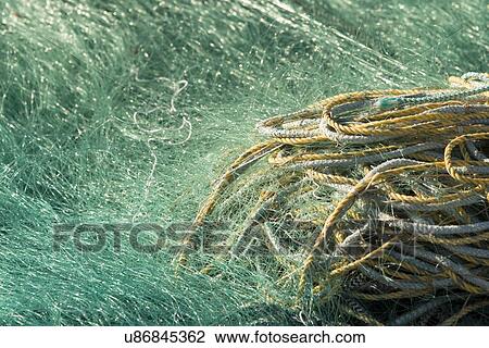 Close-up of a fishing net, Trout River, Southeast Brook Falls, Gros Morne National Park, Newfoundland and Labrador, Canada View Large Photo Image Stock Image - Close-up of a fishing net, Trout River, Southeast Brook Falls, Gros Morne National Park, Newfoundland and Labrador, Canada. Fotosearch