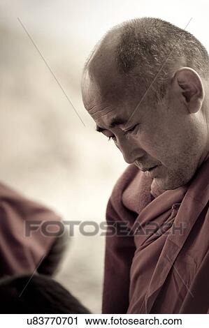 Close-up of a monk, Bhutan View Large Photo Image Stock Image - Close-up of a monk, Bhutan. Fotosearch
