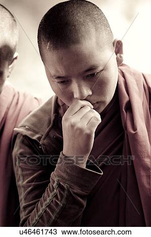 Close-up of a monk thinking, Bhutan View Large Photo Image Stock Image - Close-up of a monk thinking, Bhutan. Fotosearch