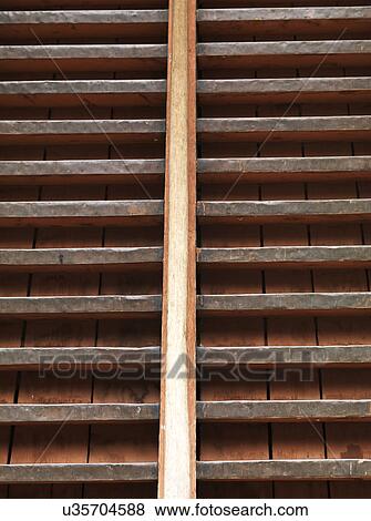 Stock Photo - Close-up of a shelf in Punakha Monastery, Punakha, Bhutan. Fotosearch