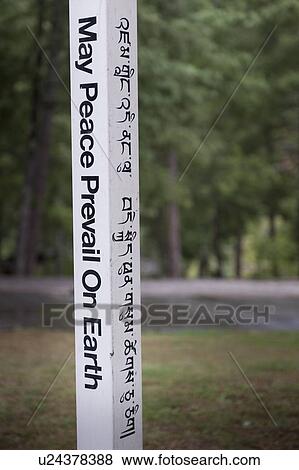 Stock Photo - Close-up of text on a pole, Como Resort, Uma Paro, Paro District, Bhutan. Fotosearch