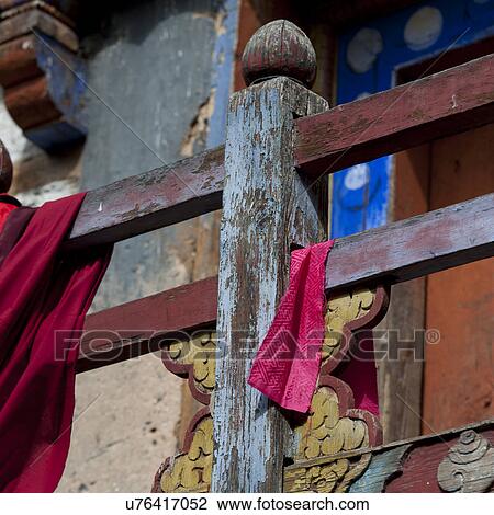 Cloth draped over a rail at the Wangdichholing Palace, Bhutan View Large Photo Image Stock Image - Cloth draped over a rail at the Wangdichholing Palace, Bhutan. Fotosearch