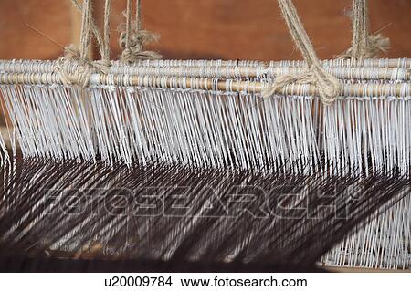 Cotton threads on loom, Chhume Valley, Zungney, Bumthang District, Bhutan View Large Photo Image Picture - Cotton threads on loom, Chhume Valley, Zungney, Bumthang District, Bhutan. Fotosearch