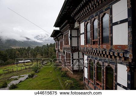 Dewachen Hotel on a hill, Phobjikha Valley, Bhutan View Large Photo Image Stock Photography - Dewachen Hotel on a hill, Phobjikha Valley, Bhutan. Fotosearch