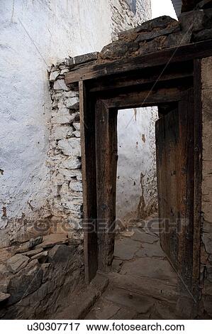 Doorway of Tamchhog Lhakhang, Paro Valley, Paro District, Bhutan View Large Photo Image Stock Photo - Doorway of Tamchhog Lhakhang, Paro Valley, Paro District, Bhutan. Fotosearch