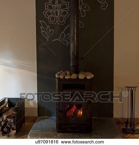 Fireplace in a room of Como Resort, Uma Paro, Paro District, Bhutan View Large Photo Image Stock Photograph - Fireplace in a room of Como Resort, Uma Paro, Paro District, Bhutan. Fotosearch