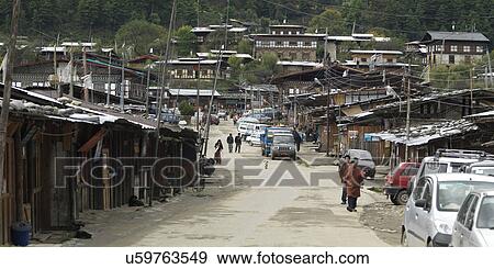 Stock Photo - Houses along the road, Chokhor Town, Bumthang District, Bhutan. Fotosearch