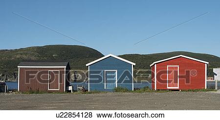 Stock Photo - Huts on beach, Southeast Brook Falls, Gros Morne National Park, Newfoundland and Labrador, Canada. Fotosearch