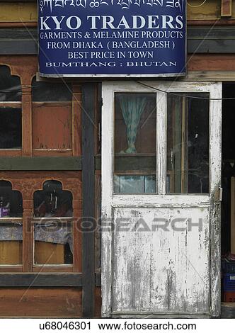 Stock Image - Information board on a building, Chokhor Town, Bumthang District, Bhutan. Fotosearch