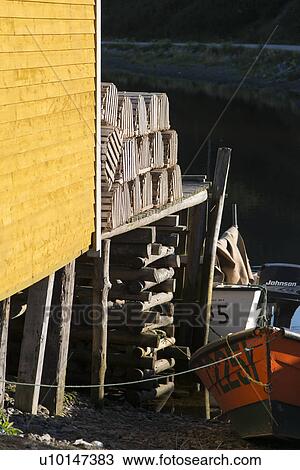 Stock Image - Lobster traps at fishing dock, Trout River, Southeast Brook Falls, Gros Morne National Park, Newfoundland and Labrador, Canada. Fotosearch