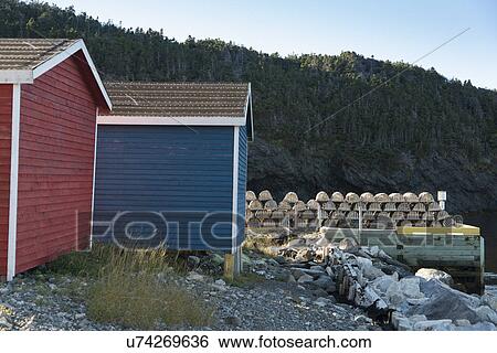 Lobster traps at fishing dock, Trout River, Southeast Brook Falls, Gros Morne National Park, Newfoundland and Labrador, Canada View Large Photo Image Stock Photograph - Lobster traps at fishing dock, Trout River, Southeast Brook Falls, Gros Morne National Park, Newfoundland and Labrador, Canada. Fotosearch