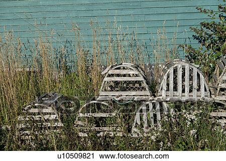 Stock Image - Lobster traps, Trout River, Southeast Brook Falls, Gros Morne National Park, Newfoundland and Labrador, Canada. Fotosearch