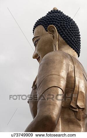 Stock Photo - Low angle view of Buddha Dordenma statue, Thimphu, Bhutan. Fotosearch