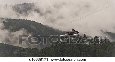 Stock Image - Low angle view of Jakar Dzong, Chokhor Valley, Bumthang District, Bhutan. Fotosearch