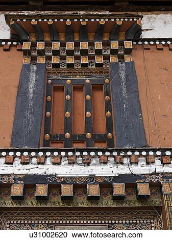 Low angle view of Rinpung Dzong, Paro Valley, Paro District, Bhutan View Large Photo Image Stock Image - Low angle view of Rinpung Dzong, Paro Valley, Paro District, Bhutan. Fotosearch