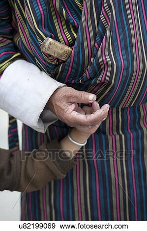 Mid section view of a person with a child, National Memorial Chorten, Thimphu, Bhutan View Large Photo Image Stock Photo - Mid section view of a person with a child, National Memorial Chorten, Thimphu, Bhutan. Fotosearch