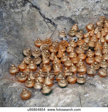 Picture - Miniature buddha statues in Bhutan. Fotosearch