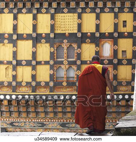 Monk at a Rinpung Dzong, Paro Valley, Paro District, Bhutan View Large Photo Image Stock Photo - Monk at a Rinpung Dzong, Paro Valley, Paro District, Bhutan. Fotosearch