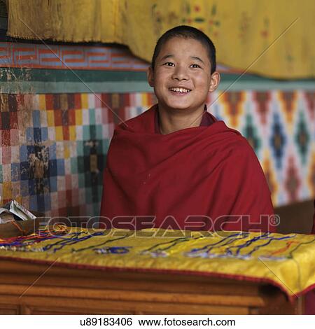 Stock Photograph - Monk at a Rinpung Dzong, Paro Valley, Paro District, Bhutan. Fotosearch