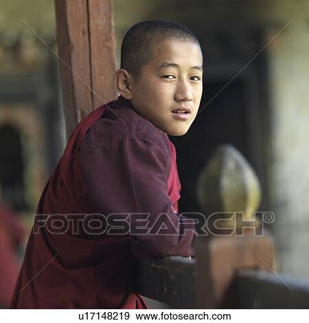 Stock Photo - Monk at Tamshing Goemba, Chokhor Valley, Bumthang District, Bhutan. Fotosearch