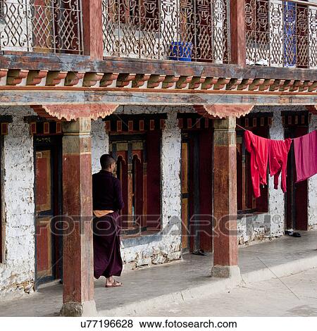 Stock Photo - Monk at the monastery in Kharchung Goemba, Bumthang District, Chokhor Valley, . Fotosearch