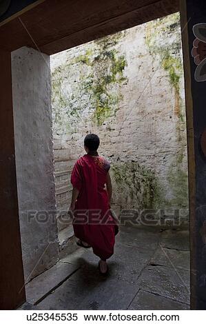 Monk in Trongsa Dzong, Trongsa, Bhutan View Large Photo Image Stock Photography - Monk in Trongsa Dzong, Trongsa, Bhutan. Fotosearch
