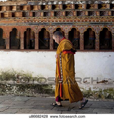 Monk in Wangdue Dzong, Wangdue Phodrang, Bhutan View Large Photo Image Stock Photo - Monk in Wangdue Dzong, Wangdue Phodrang, Bhutan. Fotosearch