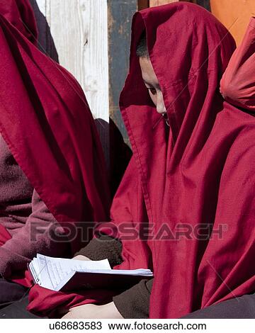 Monk reading a book, Bhutan View Large Photo Image Stock Image - Monk reading a book, Bhutan. Fotosearch