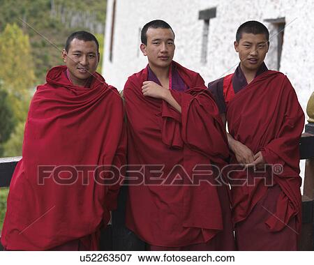 Stock Photo - Monks at Rinpung Dzong, Paro Valley, Paro District, Bhutan. Fotosearch
