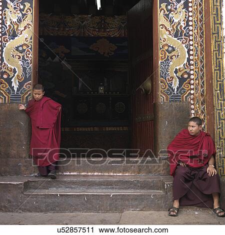 Monks at the entrance of Rinpung Dzong, Paro Valley, Paro District, Bhutan View Large Photo Image Stock Image - Monks at the entrance of Rinpung Dzong, Paro Valley, Paro District, Bhutan. Fotosearch