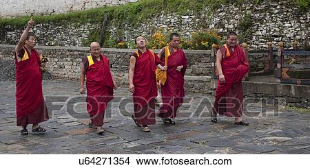 Picture - Monks at Trongsa Dzong, Trongsa, Bhutan. Fotosearch