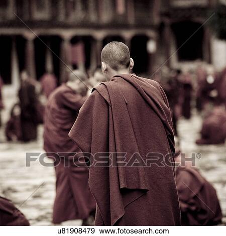 Stock Photo - Monks in courtyard Kharchung Goemba, Bumthang District . Fotosearch