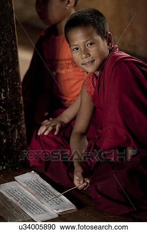 Monks studying at Chimi Lhakhang, Punakha District, Bhutan View Large Photo Image Stock Image - Monks studying at Chimi Lhakhang, Punakha District, Bhutan. Fotosearch