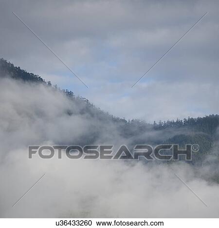 Stock Image - Mountainous landscape surrounding Thimphu in Bhutan, Asia. Fotosearch