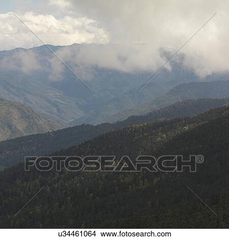 Picture - Panoramic view of mountain range, Bhutan. Fotosearch