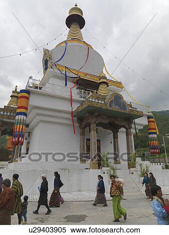 Stock Photography - People walking outside National Memorial Chorten, Thimphu, Bhutan. Fotosearch