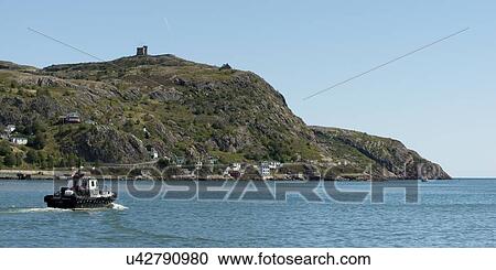 Stock Image - Pilot Tugboat at harbor, St. John's, Newfoundland and Labrador, Canada. Fotosearch