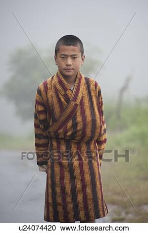 Stock Image - Portrait of a boy, Laptshaka, Punakha Valley, Punakha District, Bhutan. Fotosearch