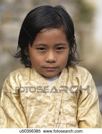 Stock Photography - Portrait of a girl, Chokhor Valley, Bumthang District, Bhutan. Fotosearch