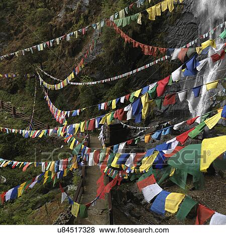 Stock Photo - Prayer flags hanging at Taktsang Monastery, Paro Valley, Paro District, Bhutan. Fotosearch