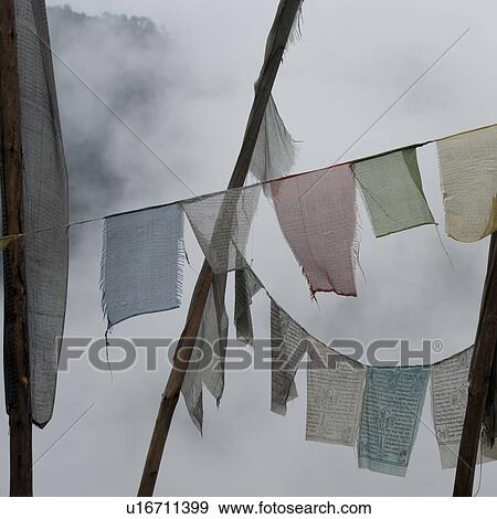 Stock Photo - Prayer flags in Trongsa District. Fotosearch